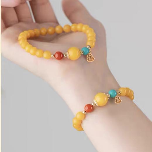 岸纾 吉祥如意天然蜜蜡南红精品手串 商品图0