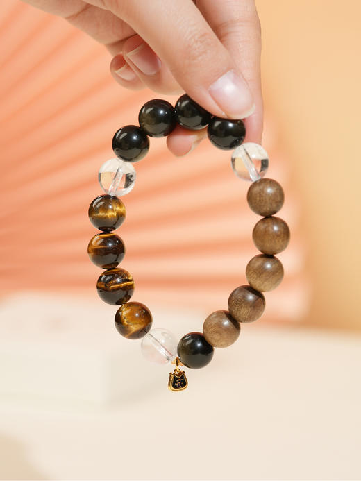 【一念七宝】财富通宝|金耀石虎眼石金丝楠木白水晶三合手串（男款） 商品图1