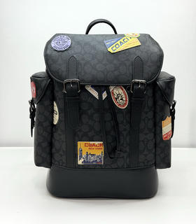 蔻c老花徽章双肩包书包