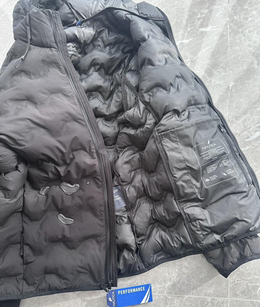 全新正品美单诺帝卡25年新款里外全热熔压胶男士运动户外防水连帽棉服
这个做了相当牛叉的里外全热熔压胶分仓锁棉
尺码S-XL 商品图2