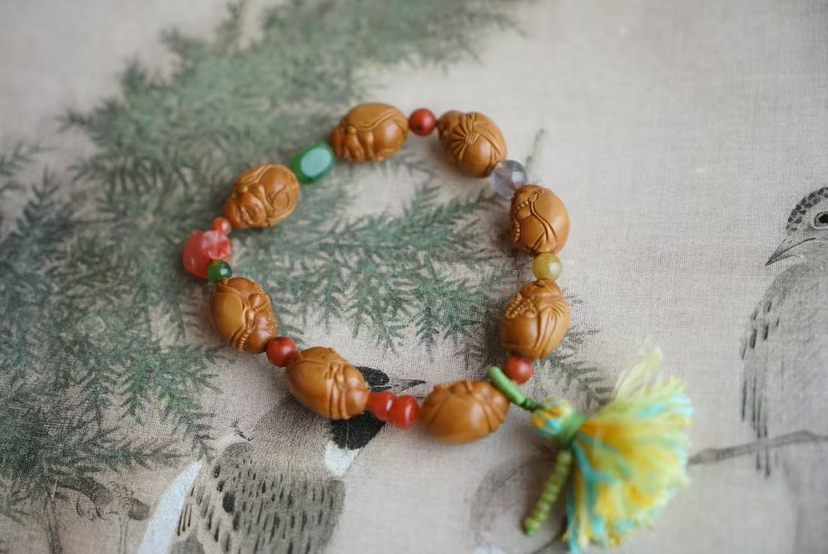 喜庆小佛｜橄榄核