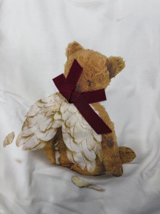 F010743新款「伤心小熊」可脱卸蝴蝶结拼接下摆长袖T恤 商品图3