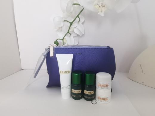 【香港直邮】LA MER/海蓝之谜旅行套装 洁面30ml+磨砂精粹水15ml*2+经典面霜7ml*2+化妆包随机发 商品图1