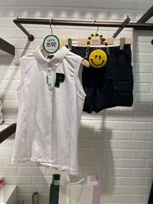 P家夏日女款无袖印花POLO上衣来了！虽迟但到，高品质出口订单剩余！真的是好甜好可爱的设计，不会显肩宽，背后褶皱印花的设计飘逸动感，运动减龄，前面徽章点缀的小设计基础款非常好搭配，随便搭长裤或者短裙! 商品图2