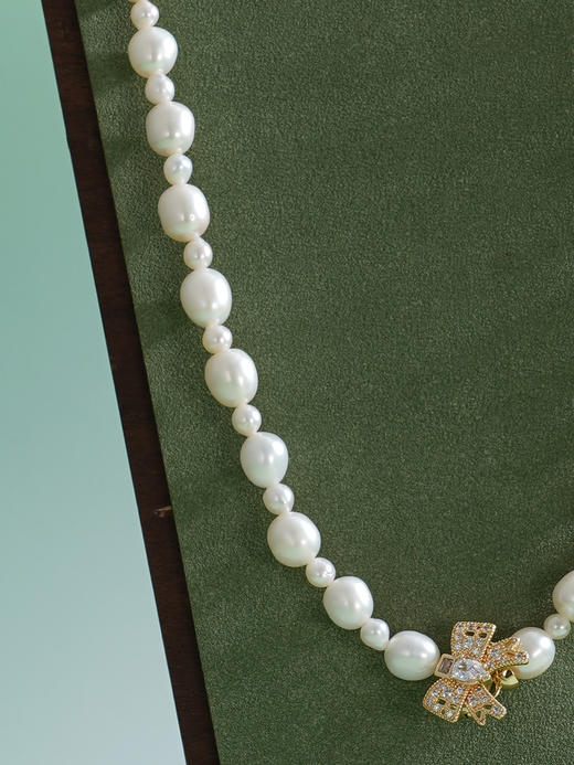 子佩集【结爱深长】珍珠惜王妃毛衣链【ZZMYL004】5-8.5mm珠镀金蝴蝶结2601 商品图4