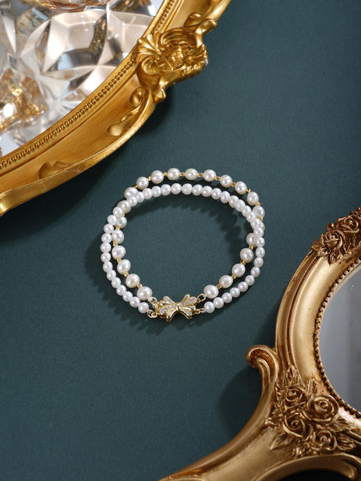 子佩集【珍爱情结】珍珠惜王妃手链【ZZSL003】4.5-6mm珠镀金蝴蝶结2601 商品图4