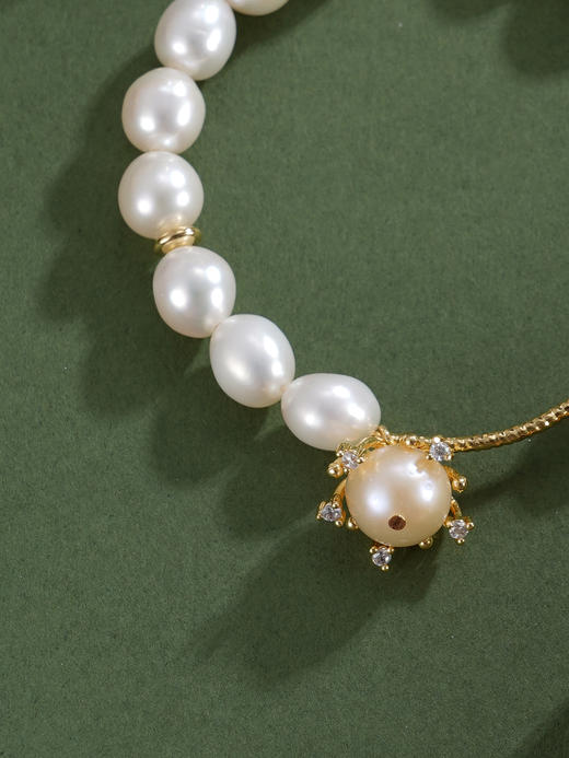子佩集【岁华共守】珍珠惜王妃手链【ZZSL015】7.2*8.2mm珠镀金吊球2601 商品图6