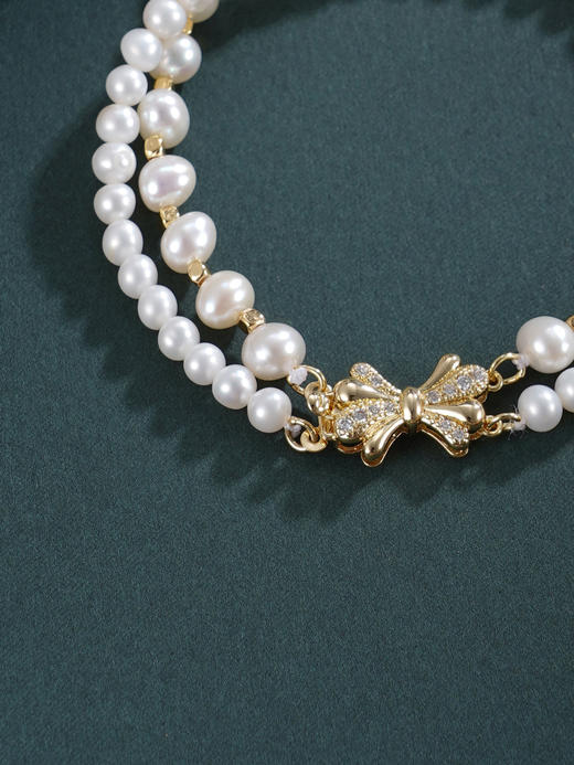 子佩集【珍爱情结】珍珠惜王妃手链【ZZSL003】4.5-6mm珠镀金蝴蝶结2601 商品图7