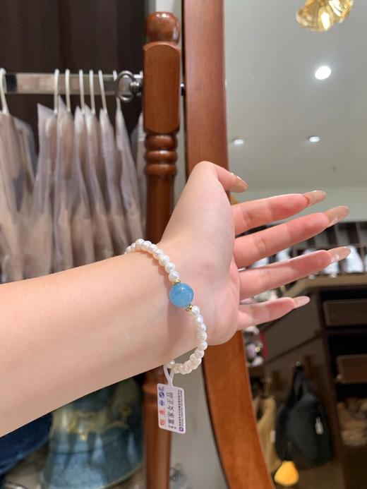F012417富家女天然珍珠海纹石手链手串配布袋 商品图6