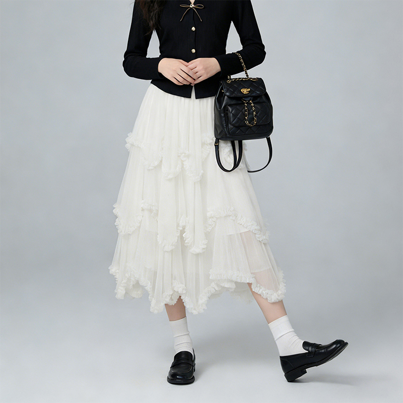西遇法式不规则荷叶边半身裙女2026年春季新款高腰网纱拼接蛋糕裙E0060121