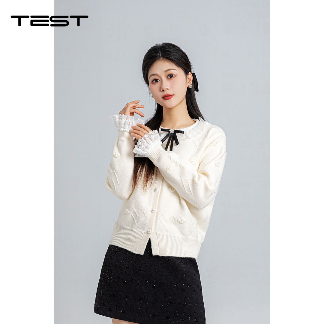 春上新蕾丝拼接甜美蝴蝶结针织开衫1261001