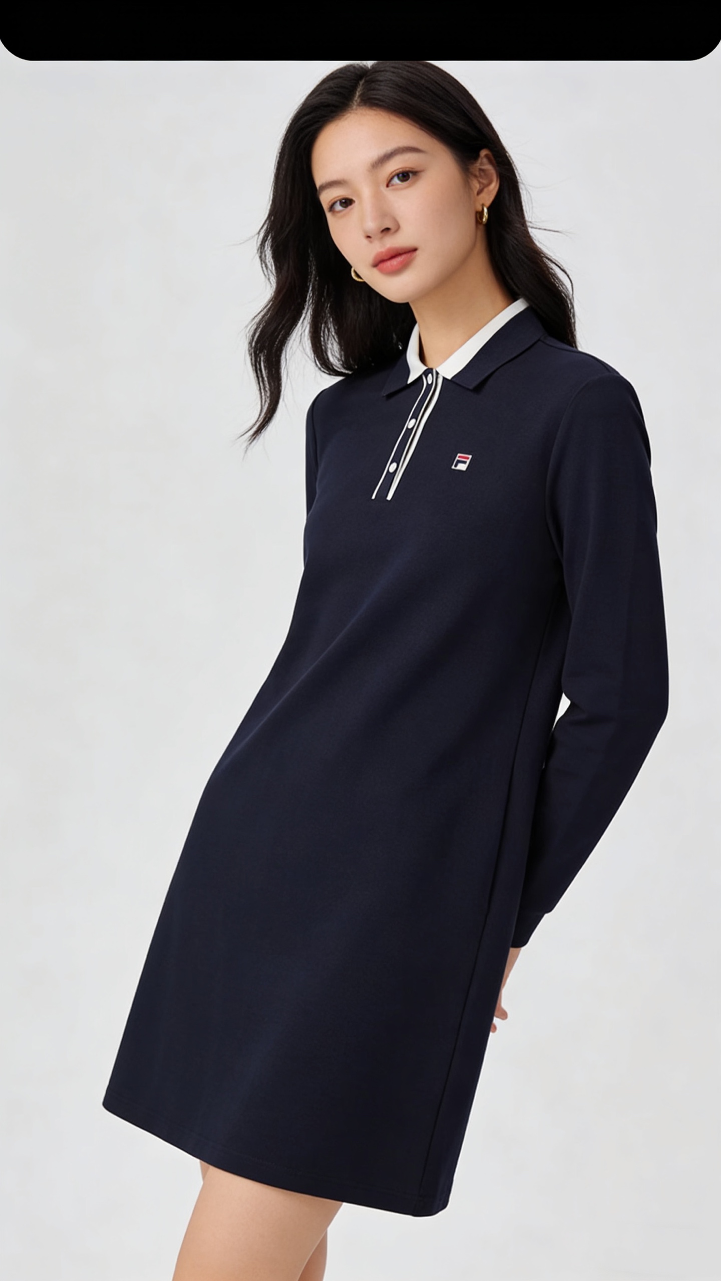 点此购买 斐乐春季女士针织POLO领连衣裙 HGN 340792