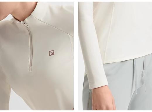 点此购买 斐乐春秋季跑步系列运动女士半拉链高领长袖针织衫 37 340770 商品图12