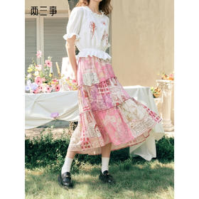 两三事 朝花未拾 2026春季新款森女风印花布拼接不对称高腰半身裙