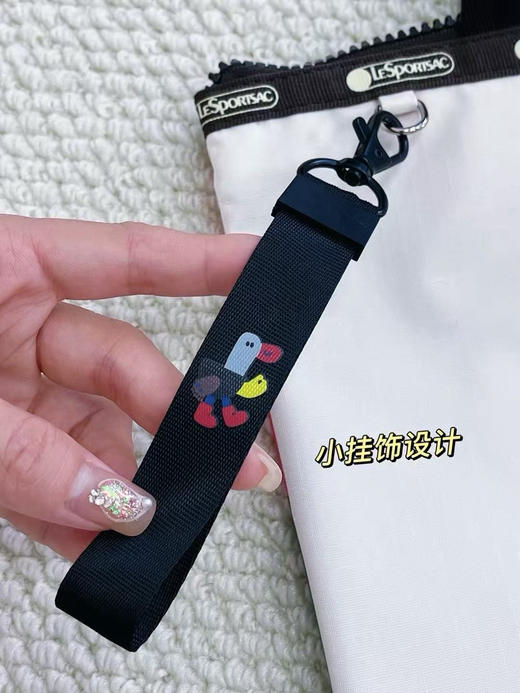 原单正品LeSportsac乐播诗X逗鸭 《100只动物》 系列托特包不规则手绘彩色格子
尺寸：上口33cm 下口24cm 高35cm 底宽 10cm 商品图4