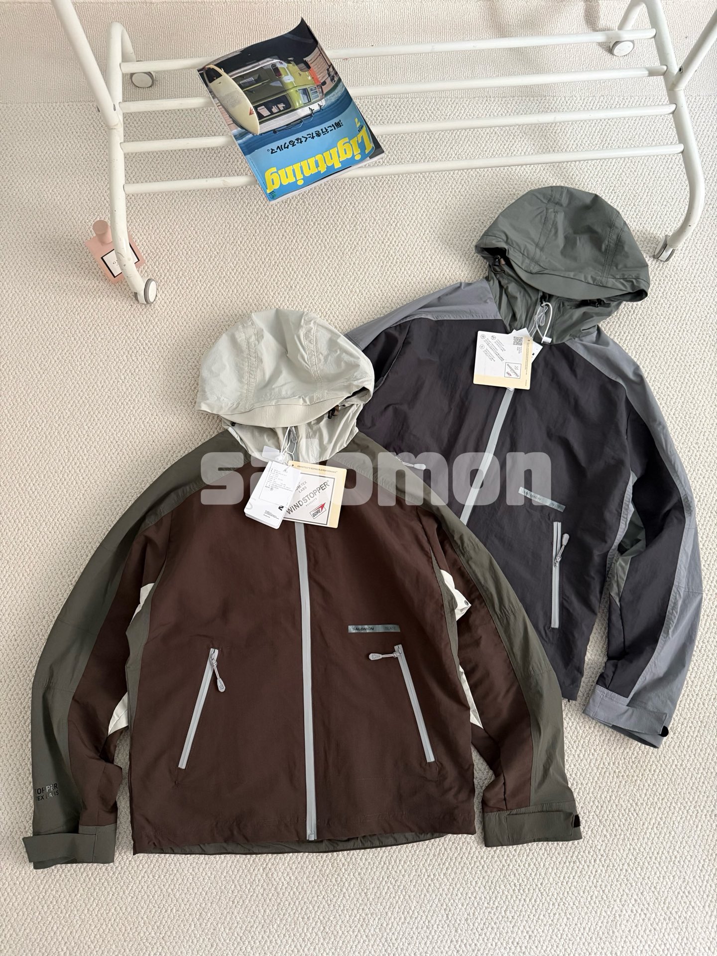 点此购买 萨洛蒙SLATE系列春秋季男女款户外防风连帽夹克 md 341369