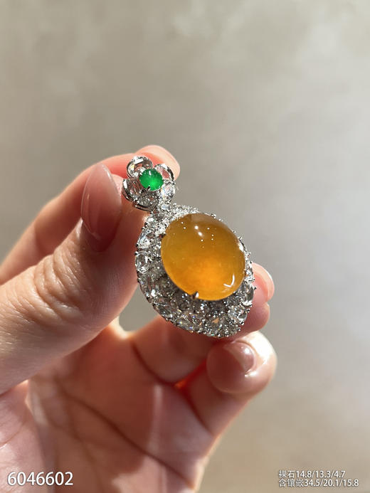 6046602，黄翡蛋面吊坠。具体价格微信咨询 商品图2