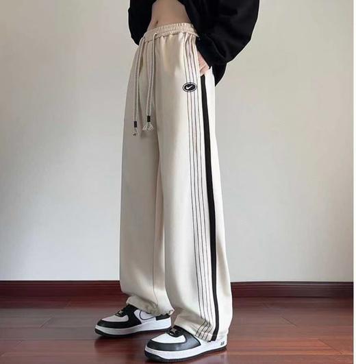 F031428时尚百搭纯色侧边拼接不对称条纹直筒学生休闲长裤 商品图0