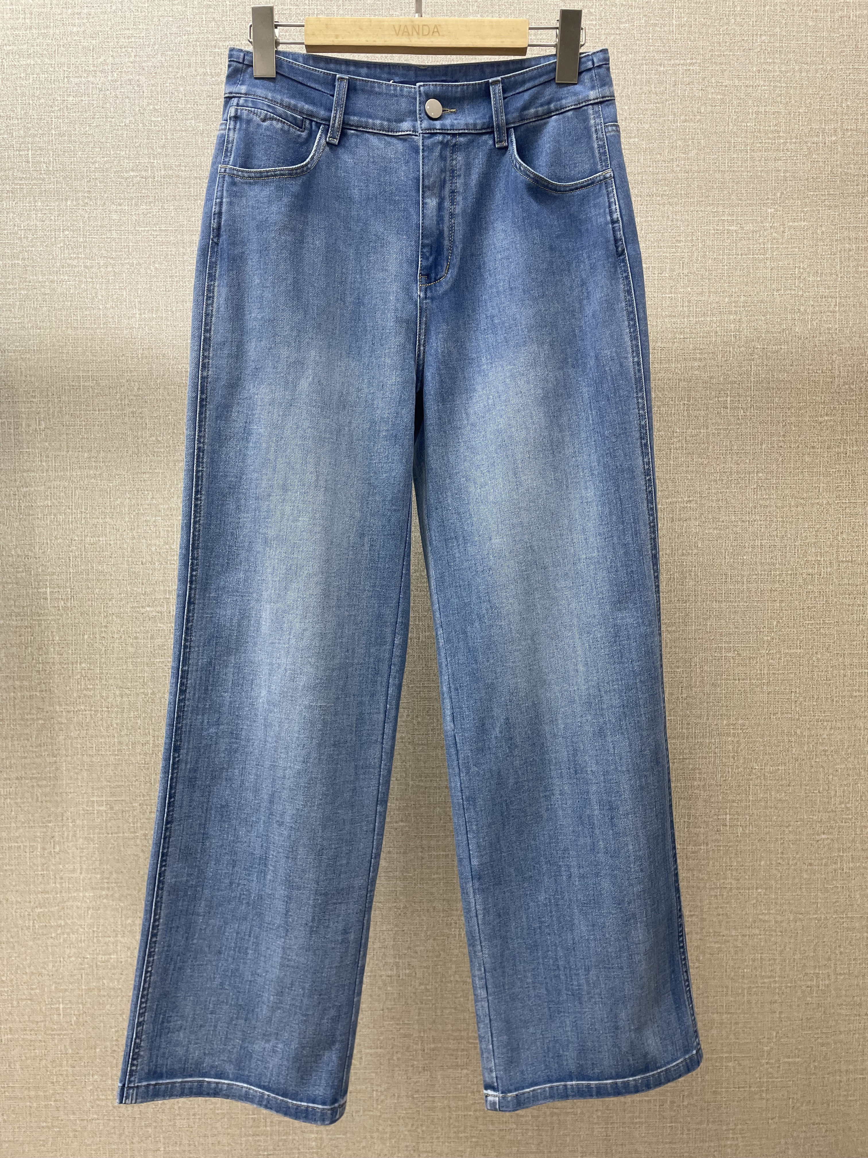 四面弹牛仔窄筒裤