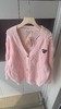 F031889早春氛围感穿搭温柔软糯粉色麻花纹针织开衫 商品缩略图1