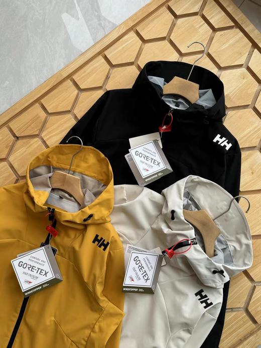 F032012新款户外压胶情侣拼接一体防风防水无缝压胶硬壳冲锋衣 商品图1