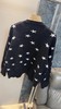 F032016春季新款休闲百搭黑底白星圆领少女感针织长袖开衫 商品缩略图5