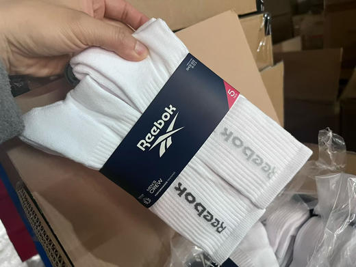 出口美国订单，正品锐步男士高帮训练袜
吸湿排汗缓震毛巾袜，均码40-45
五双一卡，两卡十双99包邮
每卡都有二个款混搭，没有拆搭 商品图0