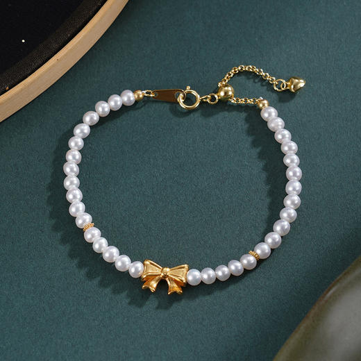 子佩集【巧结情缘】银S925珍珠惜王妃手链【SGB0648001】3.5mm珠镀金蝴蝶结儿童2601 商品图0
