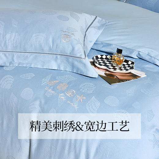 多喜爱 全棉提花四件套 深海/山茶日记/羽之翼 丝光质感 柔滑舒适精美刺绣 莹润蓝亲肤纯棉立体提花经典套件提花套件三方拼一边设计礼盒包装 商品图1