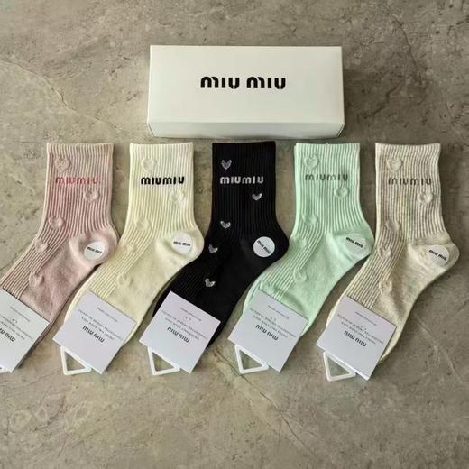 点此购买 miumiu女士中筒袜 343514 商品图0