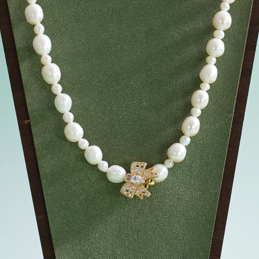 子佩集【结爱深长】珍珠惜王妃毛衣链【ZZMYL004】5-8.5mm珠镀金蝴蝶结2601 商品图1