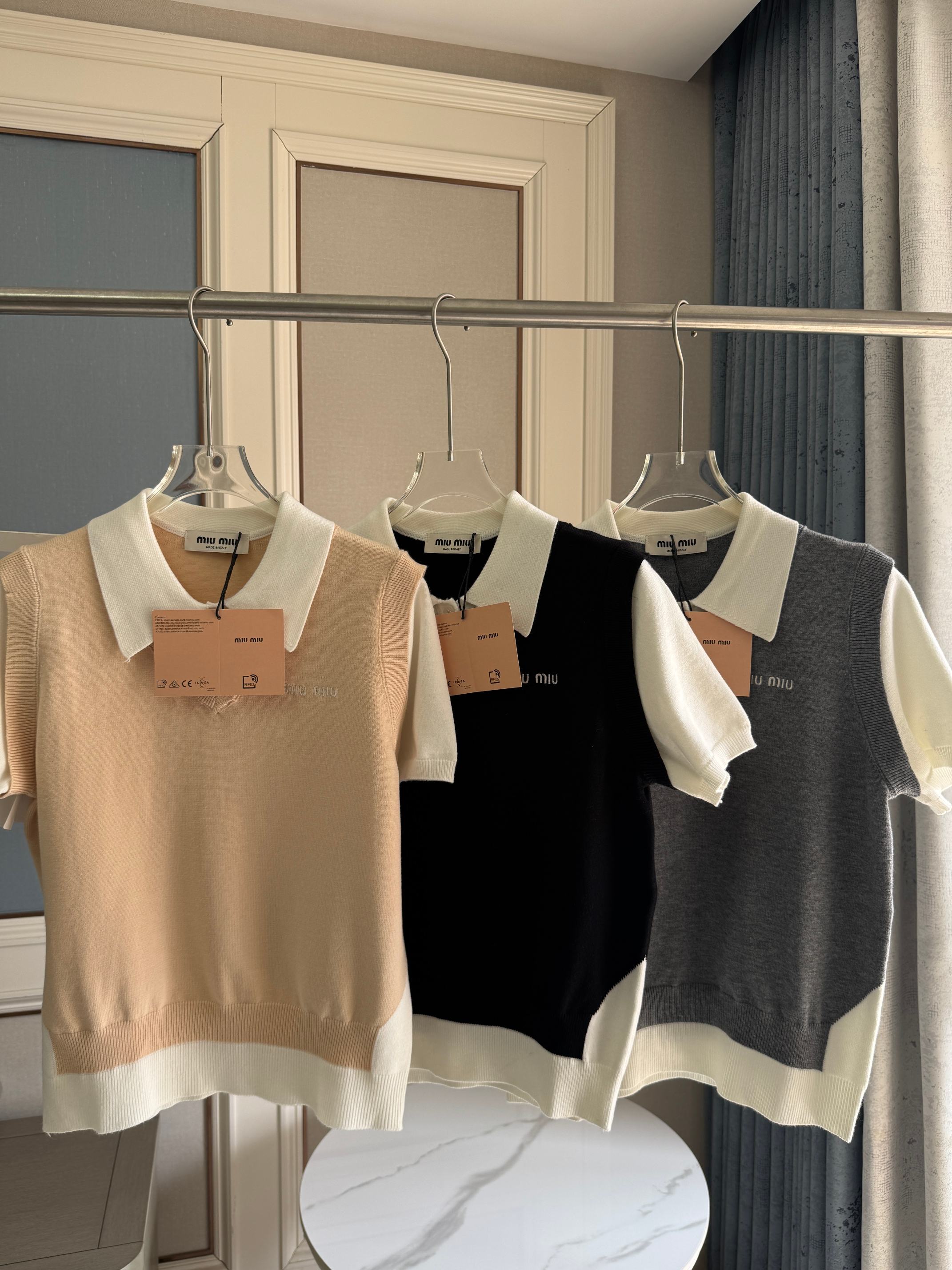 点此购买 缪缪夏季翻领polo假两件针织衫短袖T恤 mp 343619