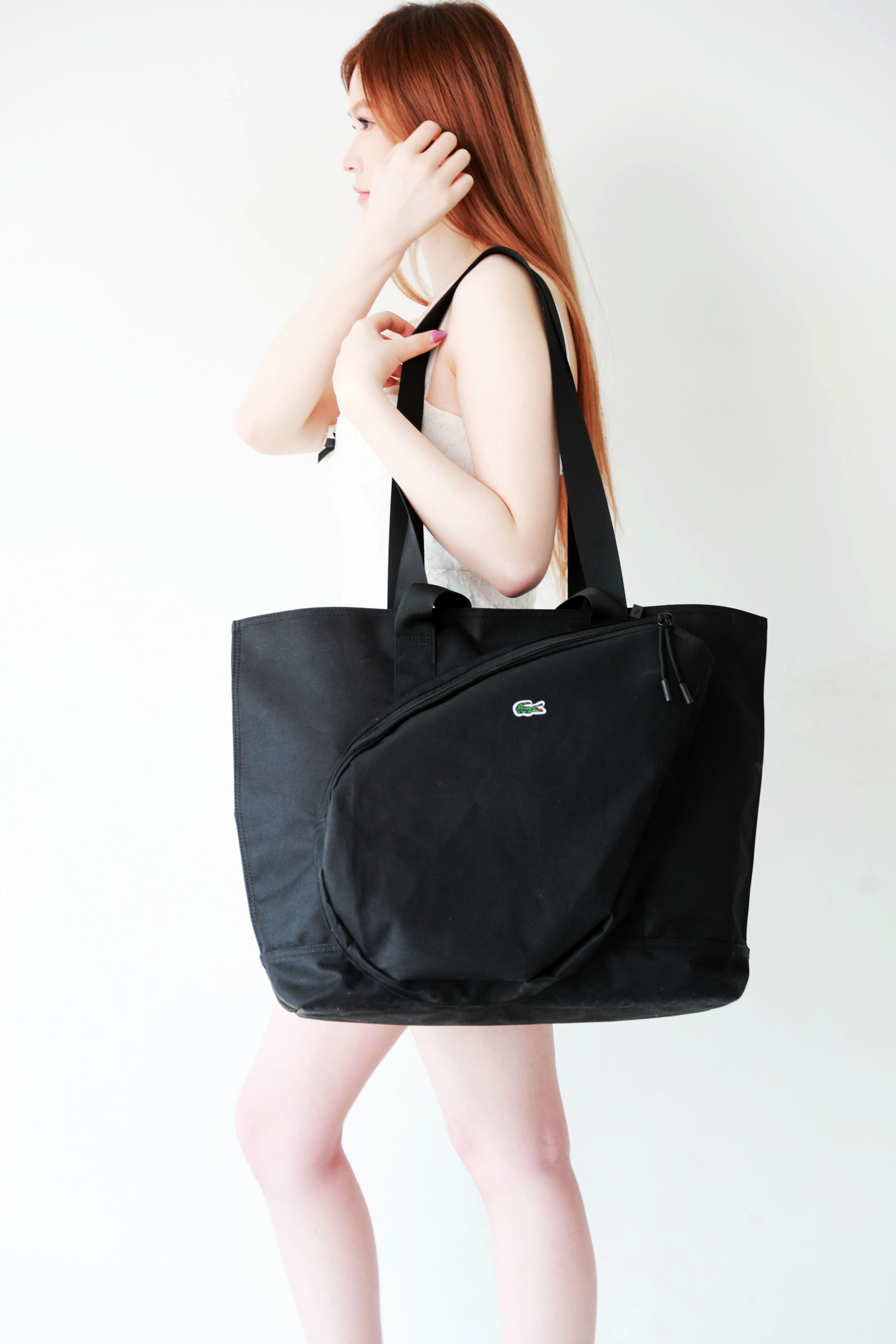 运动网球背包，26L大容量设计。老钱风长肩带情侣款单肩包E032866