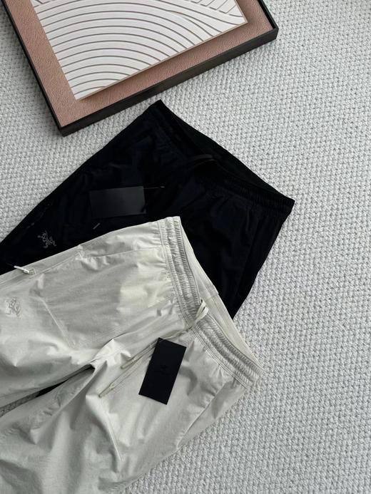 F032980通勤徒步梭织面料小标印花情侣松紧腰休闲长裤 商品图2