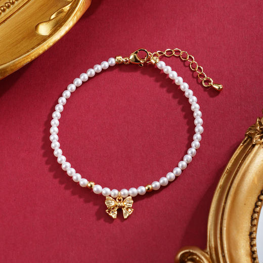 子佩集【柔光情结】珍珠惜王妃手链【XHSL002】镀金蝴蝶结2602 商品图0