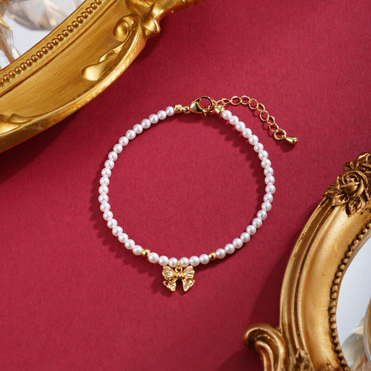 子佩集【柔光情结】珍珠惜王妃手链【XHSL002】镀金蝴蝶结2602 商品图1