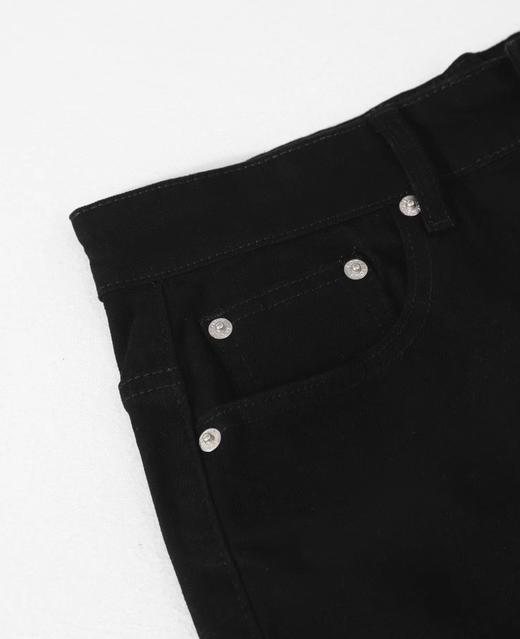 F033106夏季新款柔软亲肤水洗弹力弯刀微喇叭显瘦显高男女同款牛仔裤 商品图3