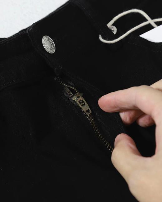 F033106夏季新款柔软亲肤水洗弹力弯刀微喇叭显瘦显高男女同款牛仔裤 商品图4