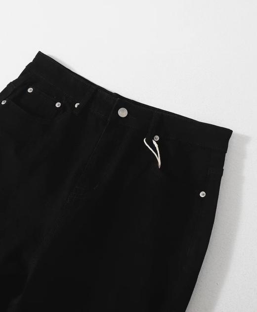 F033106夏季新款柔软亲肤水洗弹力弯刀微喇叭显瘦显高男女同款牛仔裤 商品图2