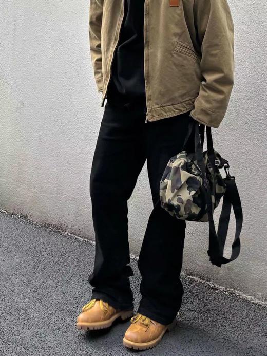 F033106夏季新款柔软亲肤水洗弹力弯刀微喇叭显瘦显高男女同款牛仔裤 商品图13