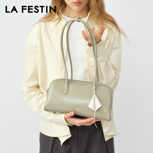 拉菲斯汀 筝筝法棍包小众白色单肩腋下腊肠包保龄球包 商品图0