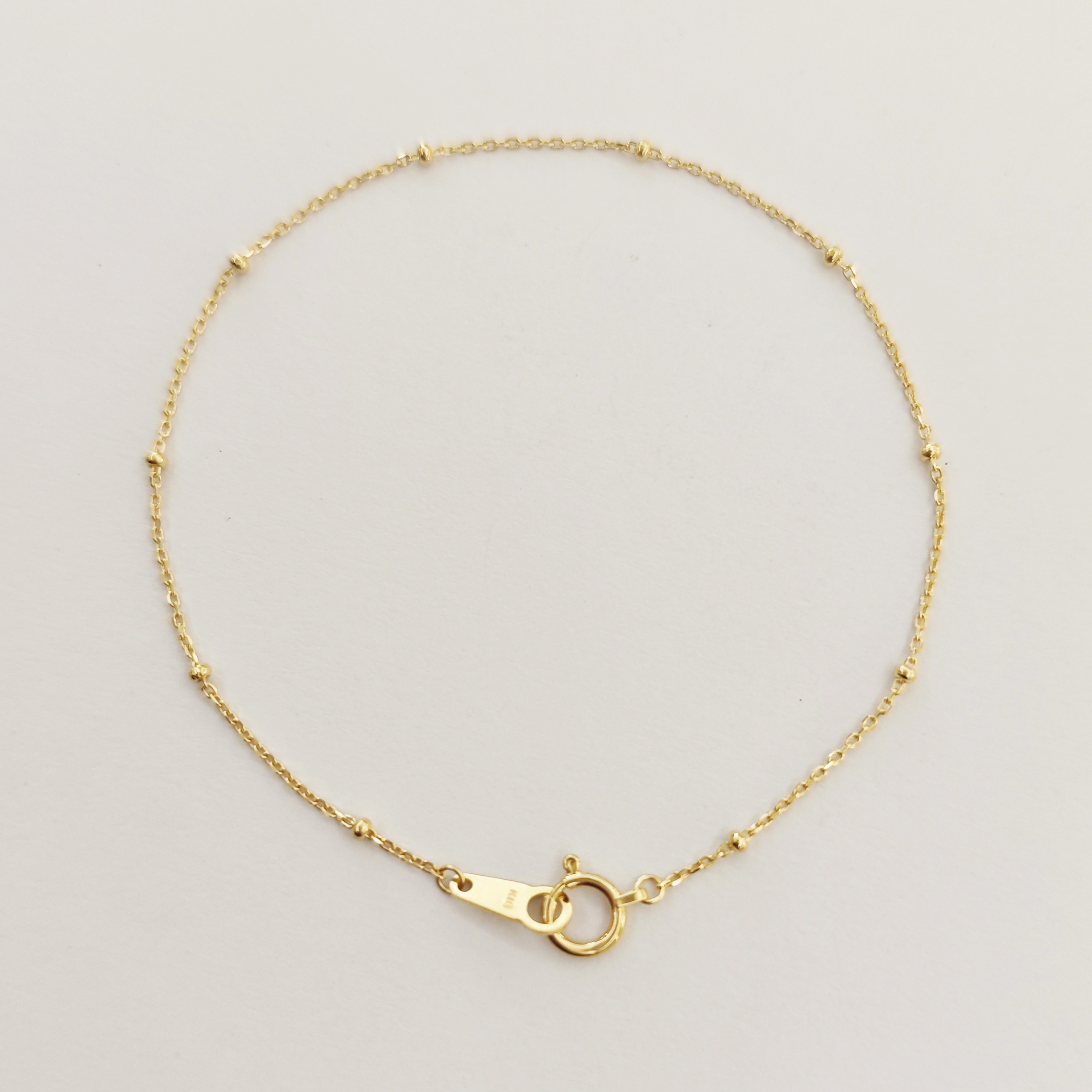 黄金手链(金豆隔珠）