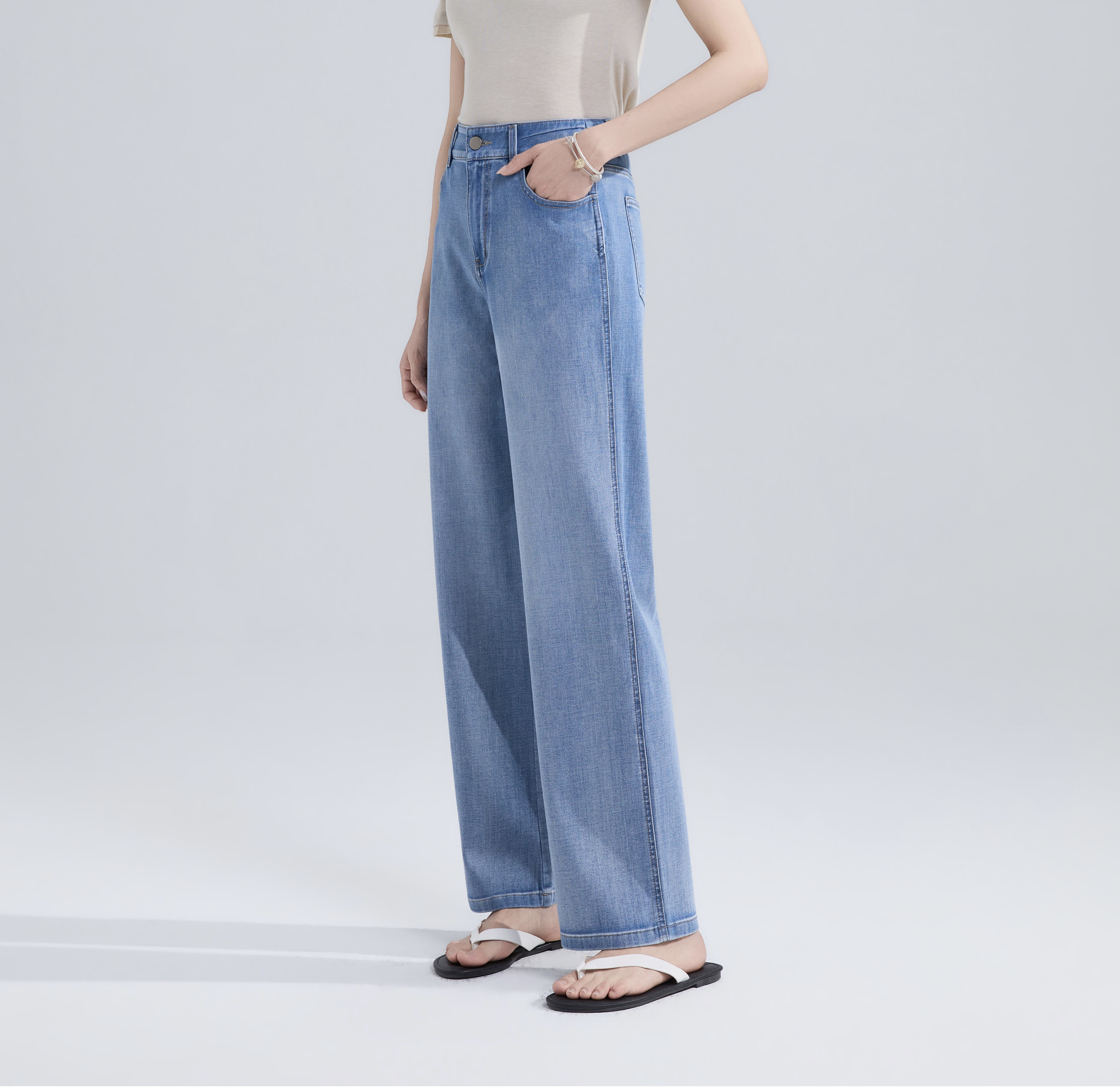 四面弹牛仔窄筒裤