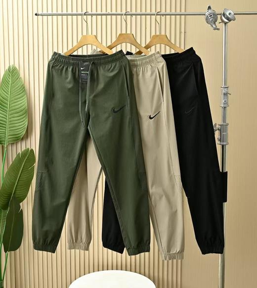 弯刀长裤 钩子耐克NIKE男款春夏季弯刀版型轻薄拼接休闲裤! 商品图0