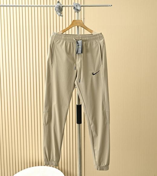 弯刀长裤 钩子耐克NIKE男款春夏季弯刀版型轻薄拼接休闲裤! 商品图1
