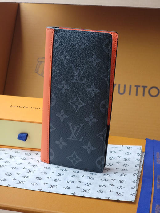 春夏特惠💰380 原单LV 长款钱夹 M25846西装夹 黑花/橙色 商品图0