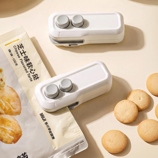 摩登主妇迷你封口机小型零食塑封袋密封神器家用手压式食品封口器 商品图0